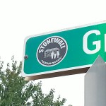 Stonewall neighborhood street sign showing the neighborhood "badge"