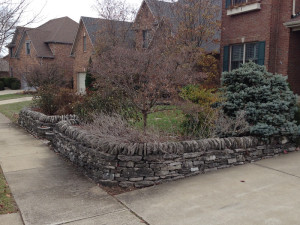 A limestone fence surrounds a yard in the Harrod's Hill area